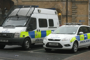 An image of police vehicles