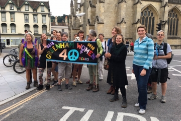 A group of protestors celebrating 40 years since the Greenham Common protest