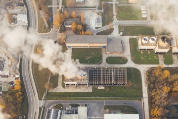 Smoke emitted from a power plant, seen from an aerial view